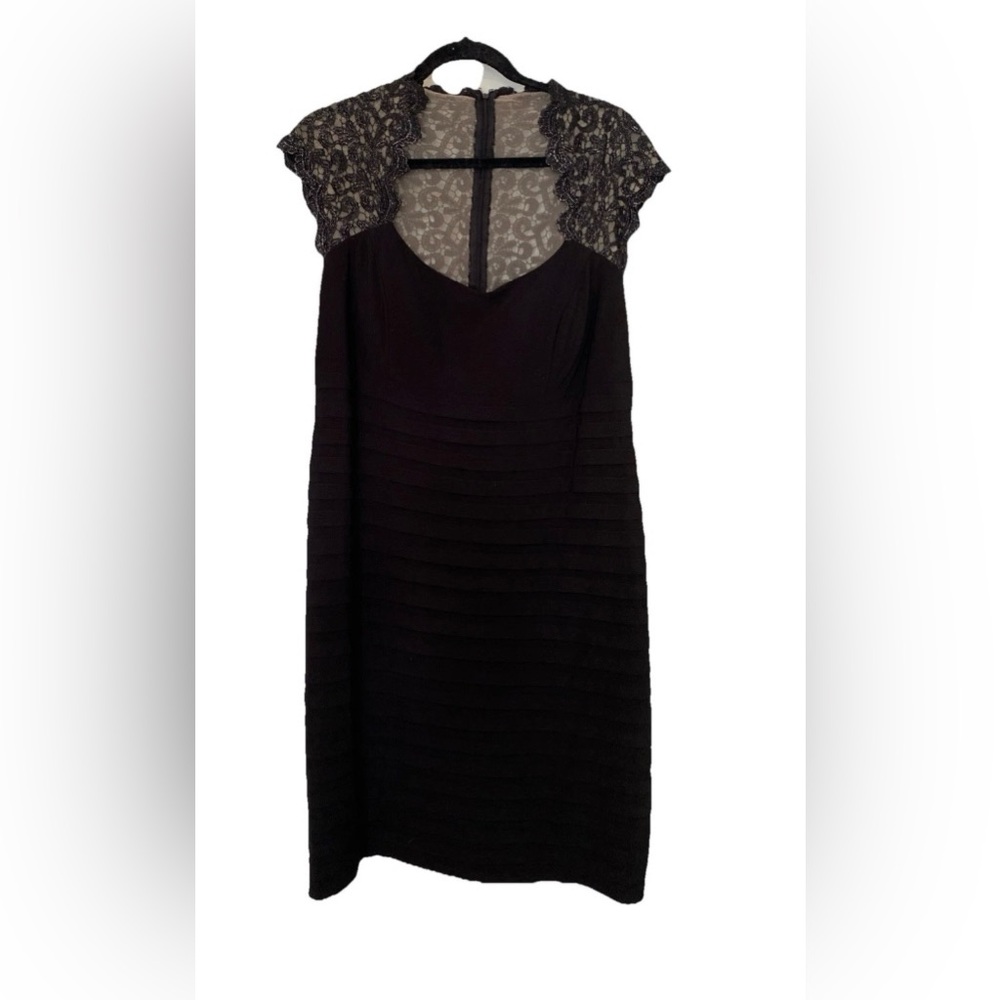 Elegant Black Lace Cap Sleeve Dress
Size 14w